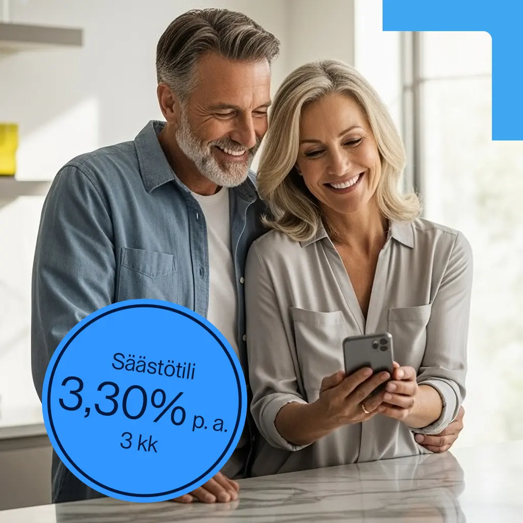 A man and a woman smiling and looking at the smartphone