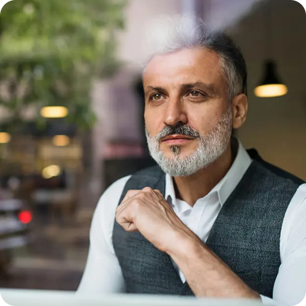 A man looking to outside