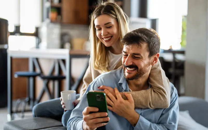 couple looking at phone