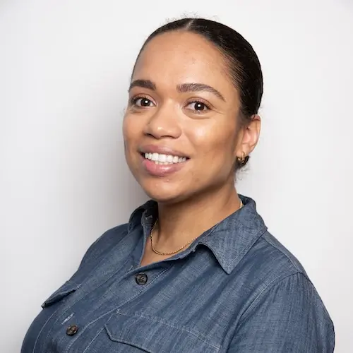 raisin-uk-robyn-demming.jpg A photo of Robyn Demming of Raisin UK, wearing a blue shirt
