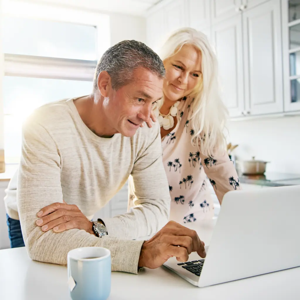 WAB-why save.png couple looking at laptop
